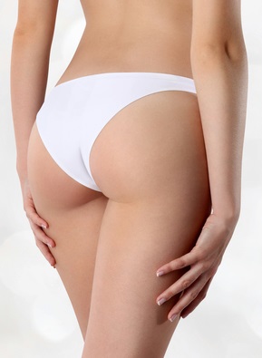 woman's butt in white panty after butt lift